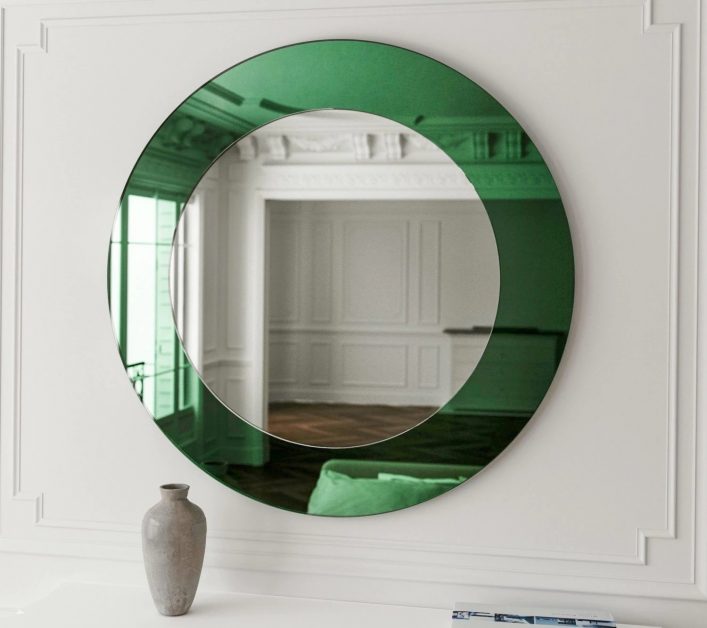 The latest designs of mirrors with geometric shapes decorate the walls of the modern home